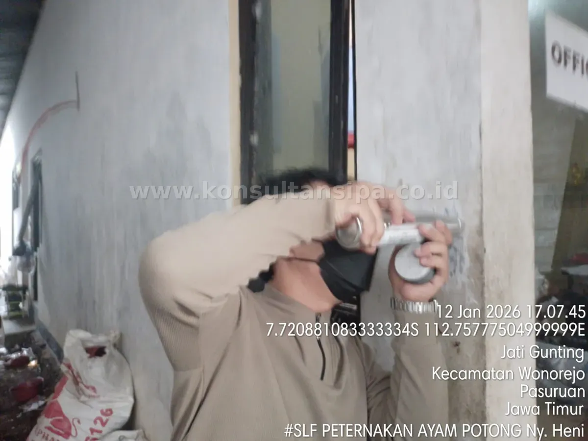 Hammer test pada dinding bangunan office peternakan sebagai syarat kelengkapan SLF